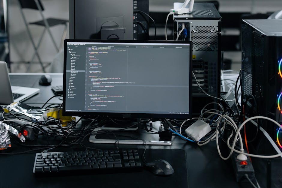 A close-up of a computer screen displaying HTML code in a text editor. The code includes tags such as <!DOCTYPE html>, <html>, <head>, <meta>, and <title>. The interface shows a dark background with s